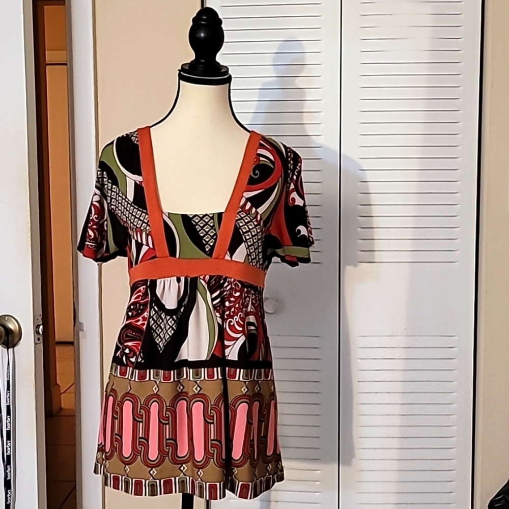 Woman's XOXO Brand Size M multi-colored patterned top; ties in back